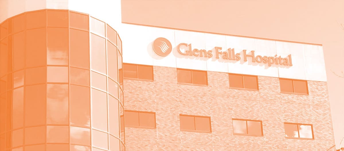 A hospital building with exterior letters reading "Glen Falls Hospital"